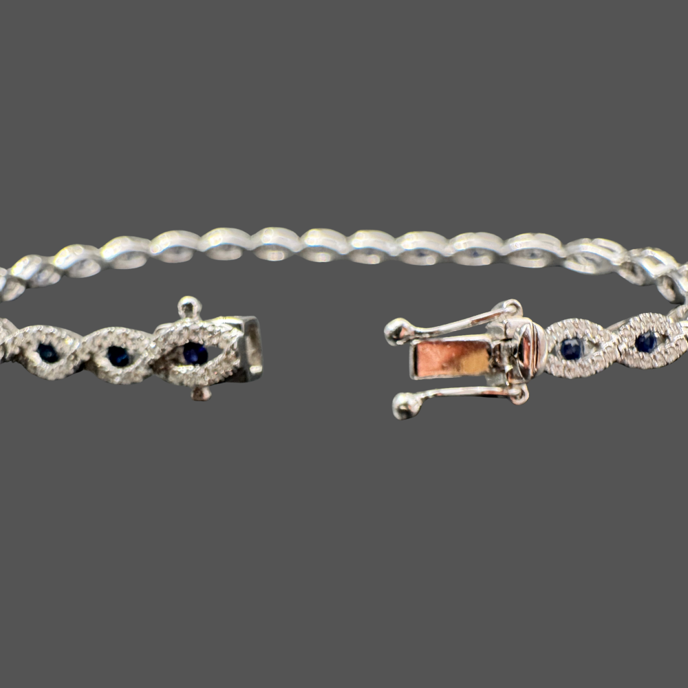 Bracelet rivière diamants et saphirs