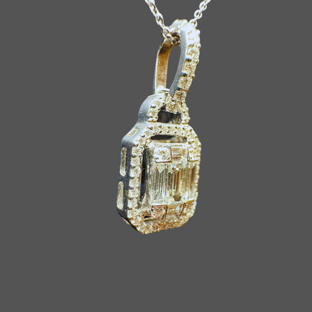 Pendentif diamant 0.56ct en or blanc avec chaîne