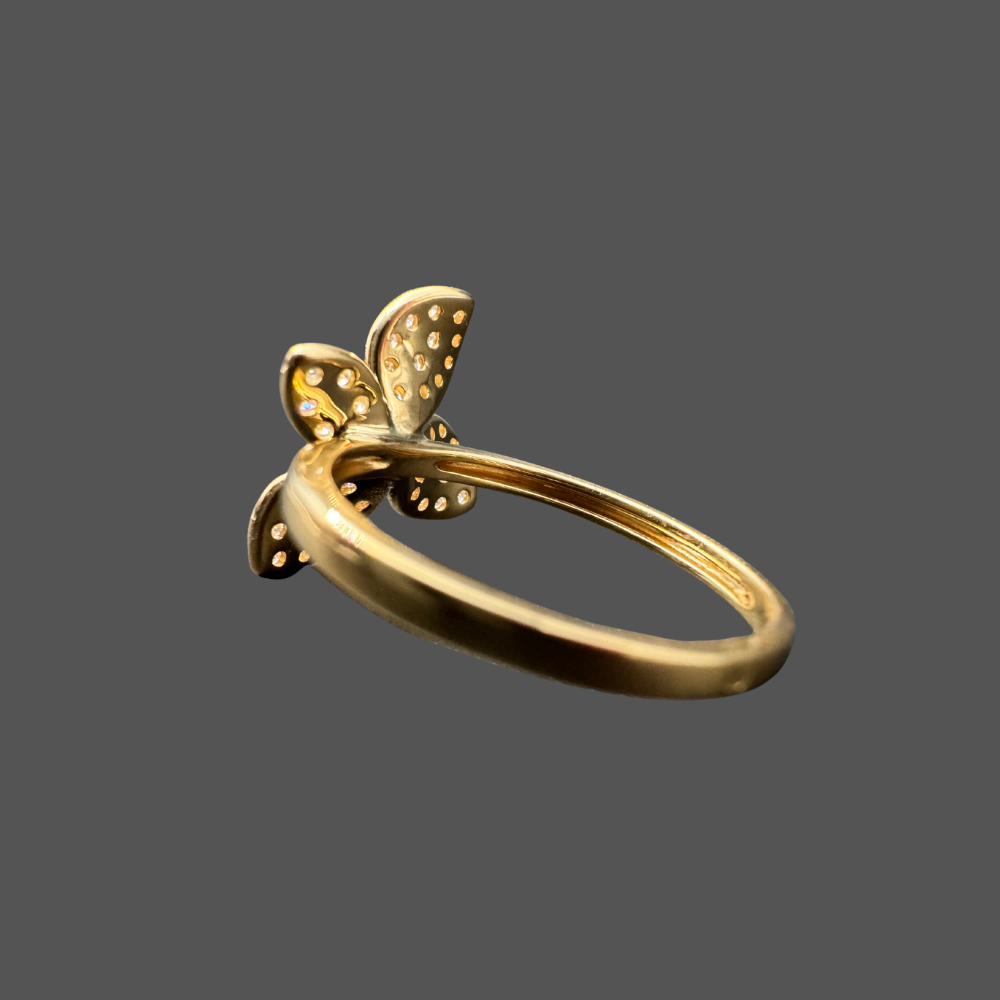 Bague fleur en or jaune 18 carats avec diamants