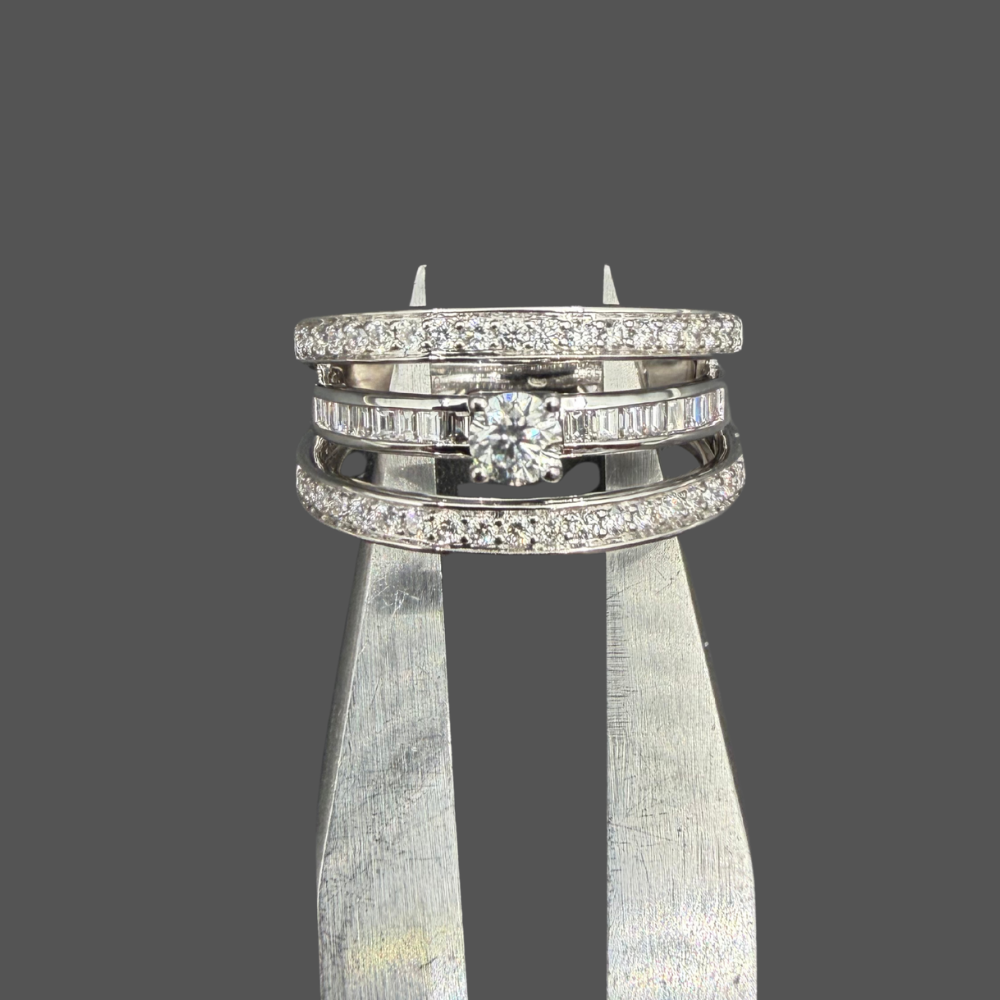 Bague - Solitaire Accompagné 0.75ct
