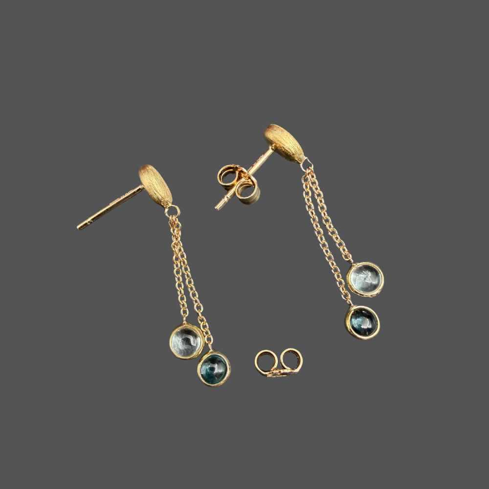 Boucles d’oreilles pendantes Femme Adorée en or jaune 18 carats – Doubles topazes bleues sur chaînes
