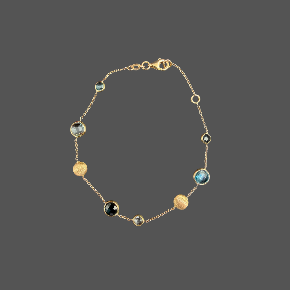 Bracelet Femme Adorée en or jaune 18 carats – Topazes bleues facettées et pastilles brossées