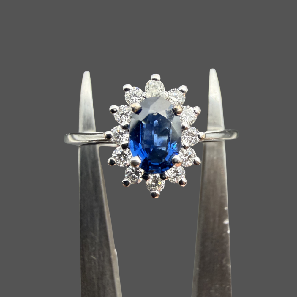 Bague entourage saphir et diamants