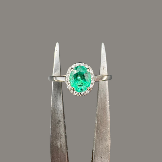 Bague entourage Emeraude 0.64ct