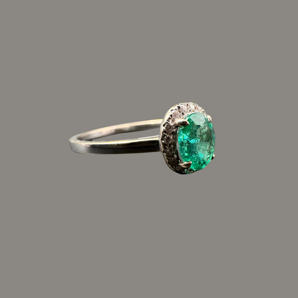 Bague entourage Emeraude 0.64ct